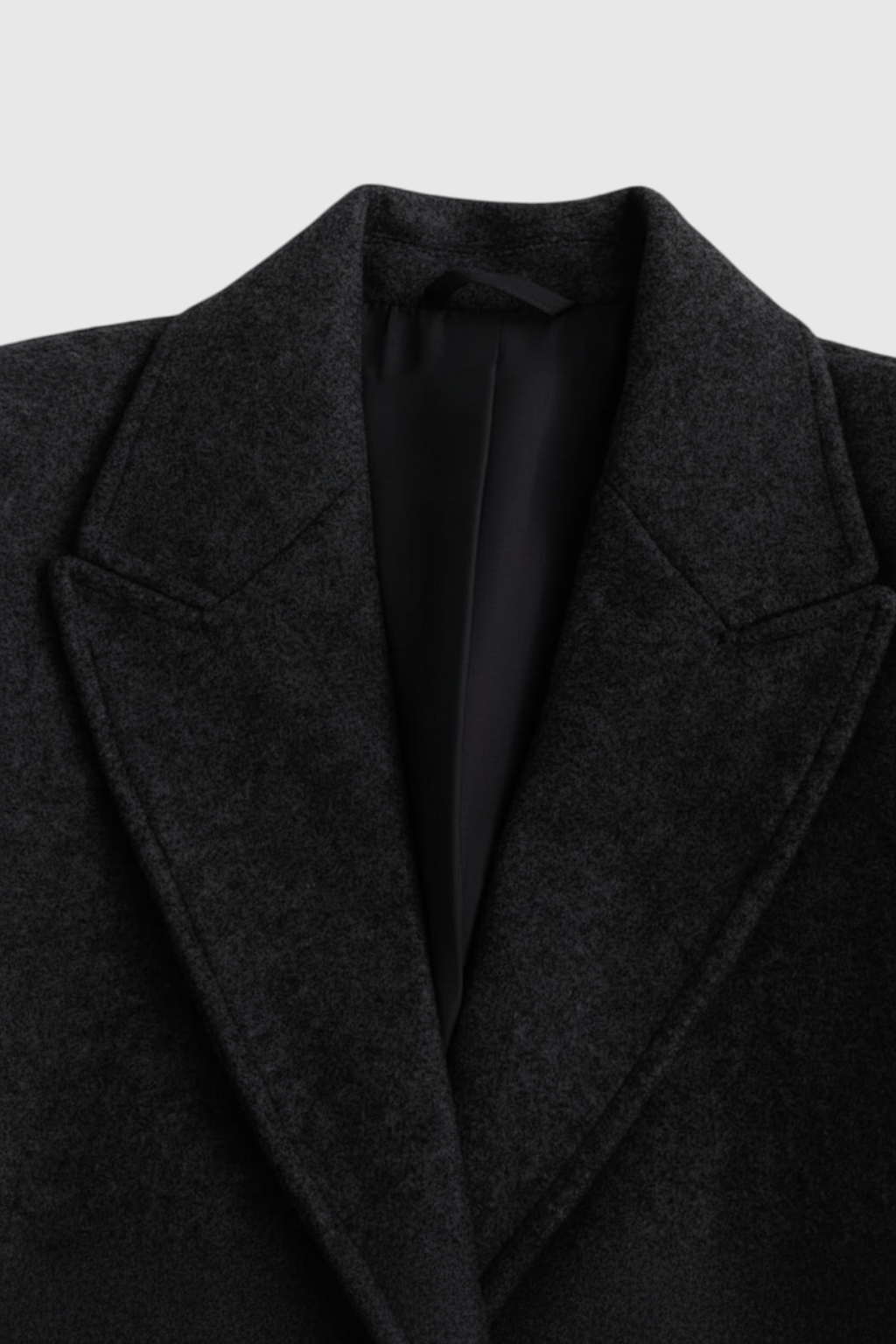 Lange Dames Zwarte Jas met Chic Revers